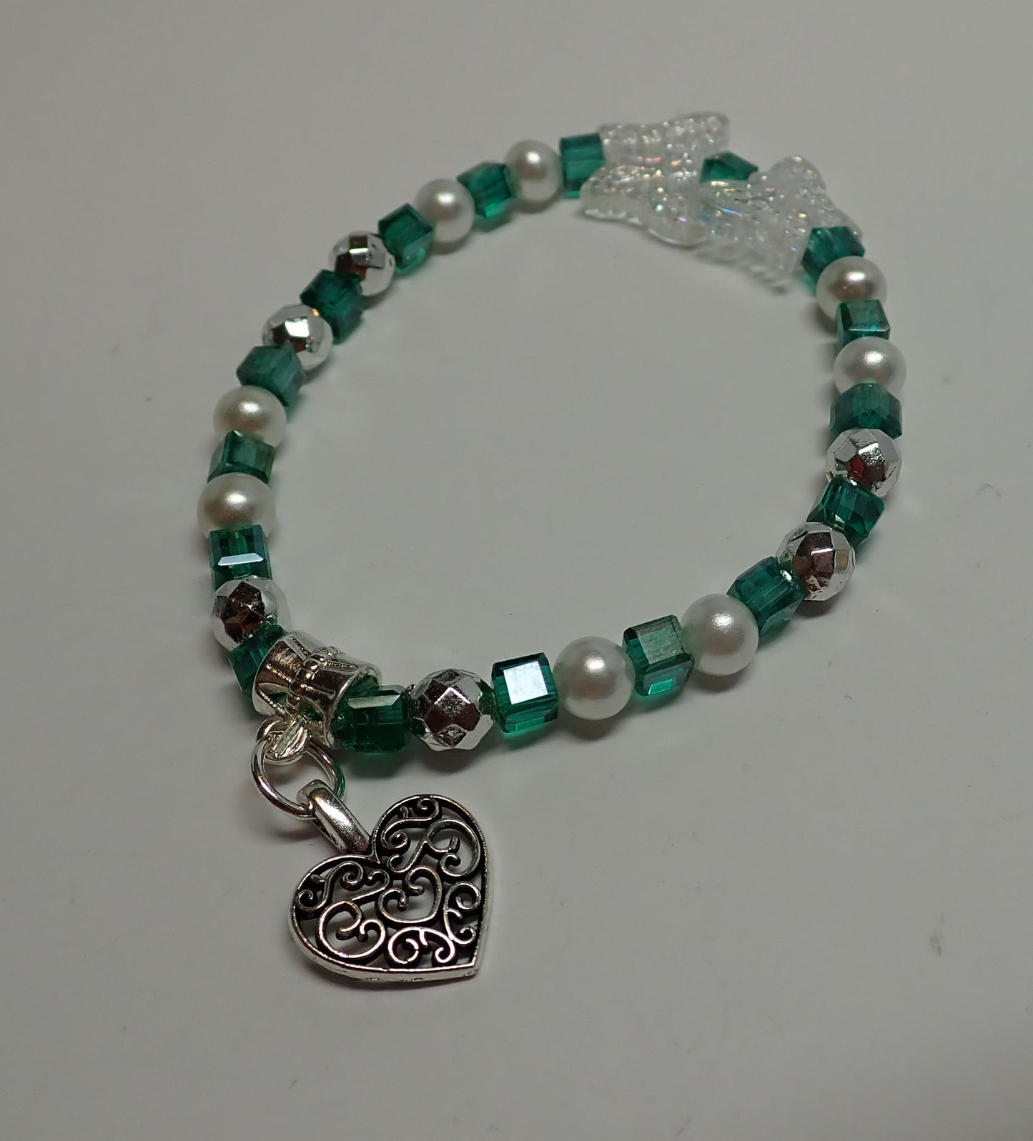 Jewelry, bracelet, green cubes, white pearls, holographic butterflies, heart charm,