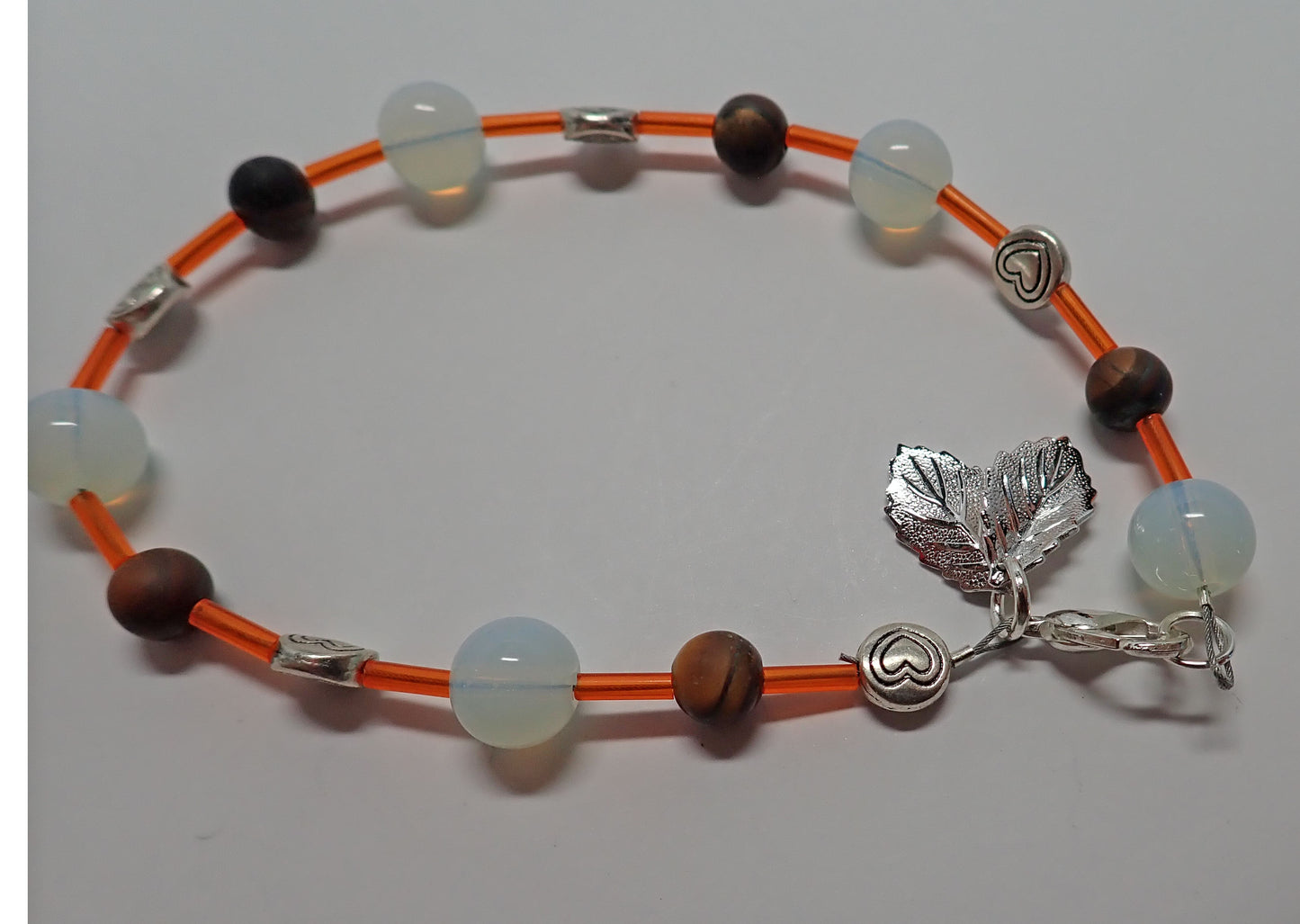 Jewelry, bracelet, glass beads, wooden beads, heart beads, leaf charms, orange, white, brown, gift
