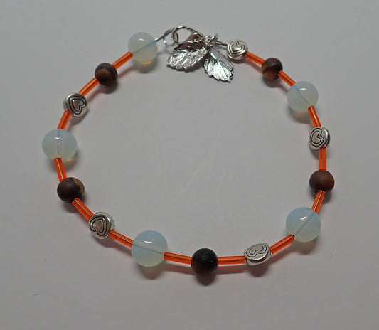 Bracelet, glass beads, wooden beads, heart beads, leaf charms, orange, white, brown, gift